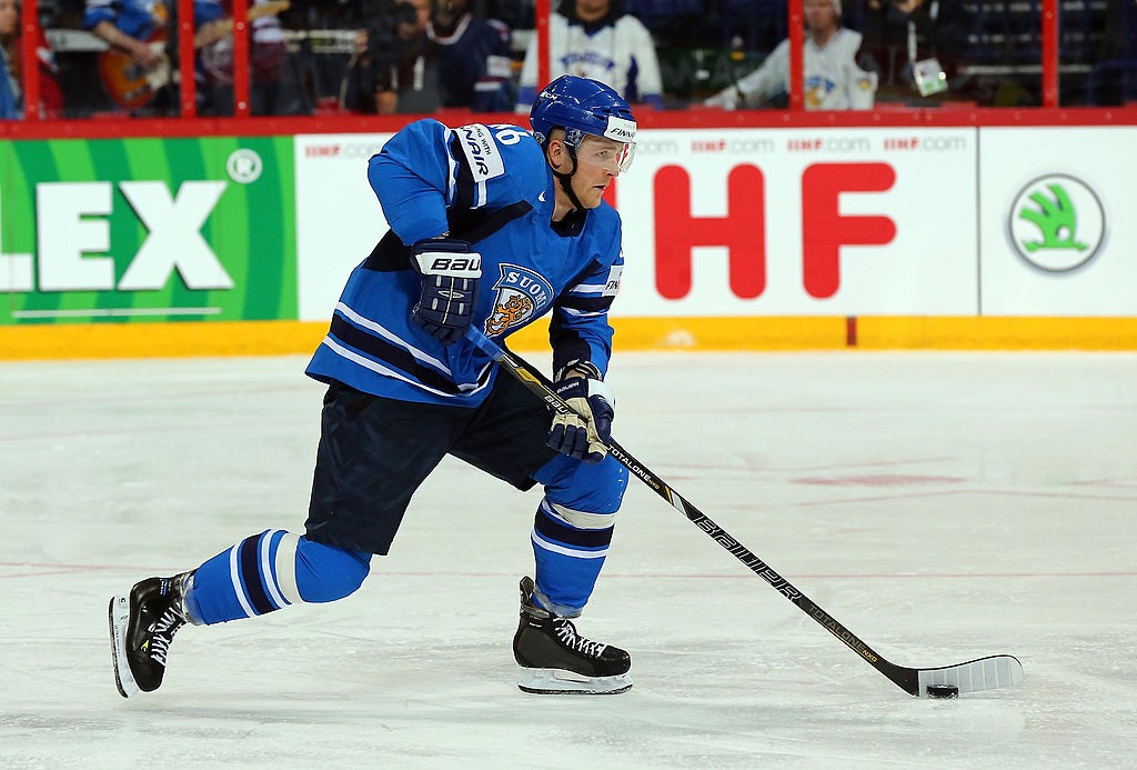 HELSINKI, FINLAND - MAY 08: Janne Jalasvaara of Finland skates with the puck during the IIHF World Championship group H match between USA and Finland at Hartwall Areena on May 8, 2013 in Helsinki, Finland. (Photo by Martin Rose/Bongarts/Getty Images)