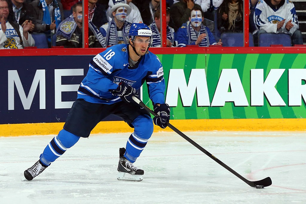 HELSINKI, FINLAND - MAY 14: Sami Lepisto of Finland skates with the puck during the IIHF World Championship group H match between Latvia and Finland at Hartwall Areena on May 14, 2013 in Helsinki, Finland. (Photo by Martin Rose/Bongarts/Getty Images)