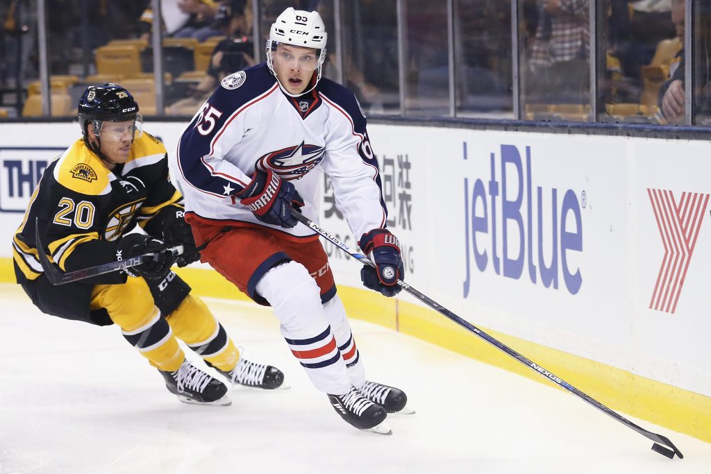 BOSTON, MA - SEPTEMBER 26: Riley Nash #20 of the Boston Bruins defends Markus Nutivaara #65 of the Columbus Blue Jackets during the first period of the preseason game at TD Garden on September 26, 2016 in Boston, Massachusetts. (Photo by Maddie Meyer/Getty Images)