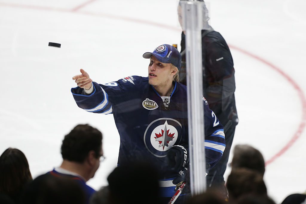 LOS ANGELES, CA - JANUARY 28: Patrik Laine #29 of the Winnipeg Jets throws a puck to the fans during the 2017 Coors Light NHL All-Star Skills Competition as part of the 2017 NHL All-Star Weekend at STAPLES Center on January 28, 2017 in Los Angeles, California. (Photo by Leon Bennett/Getty Images)